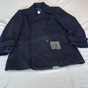 Jos A Bank Mens 61% Wool 20% polyester 19% nylon Winter. Lining 100% polyester.